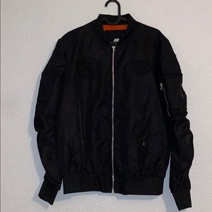Black patched embroidered bomber jacket